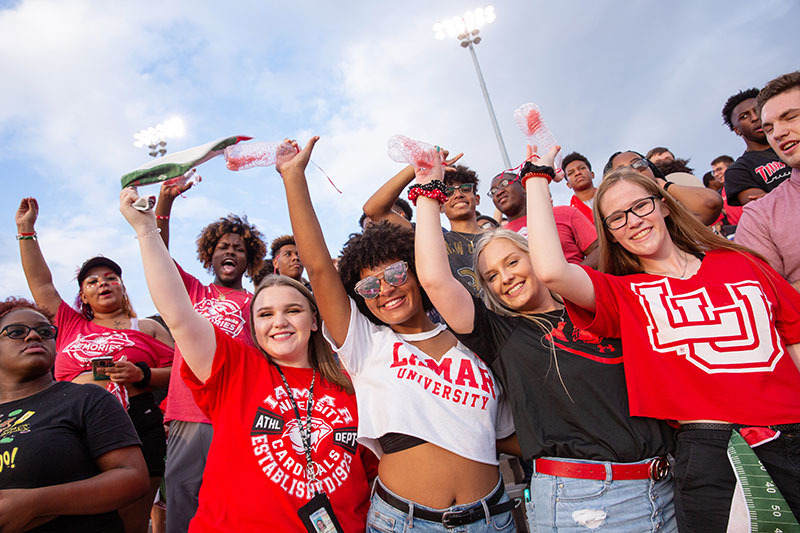 Cheering on the Lamar Cardinals