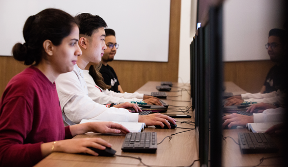 Students working in a computer lab in the College of Business